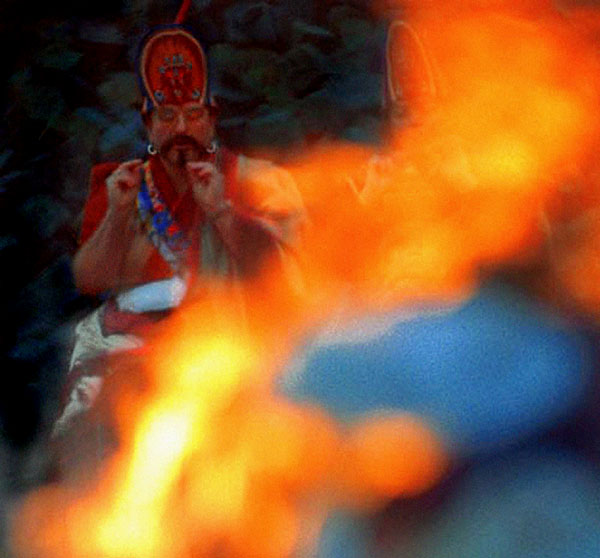 Ngak’chang Rinpoche seen through the flames